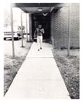 Dale Grissom, captain of the 1967 football team, starts home slowly after a hard practice.